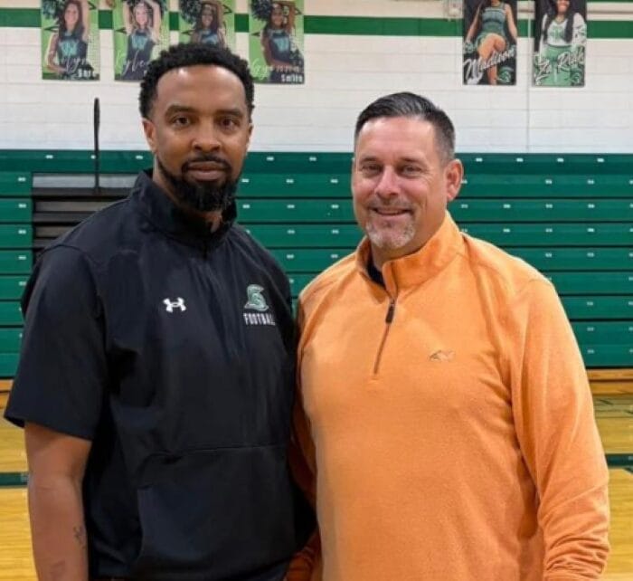 Trojans make coaching transition with Handy retiring, DC Powell gets promotion